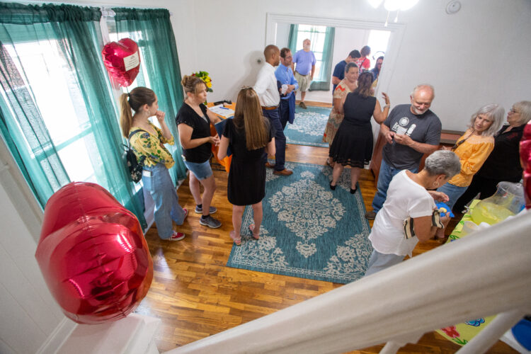 Sojourner Truth Ministries' recently renovated duplex aids immigrant family, House of Hope graduates